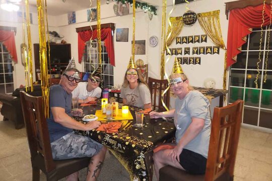4 guests celebrating Happy New Year
